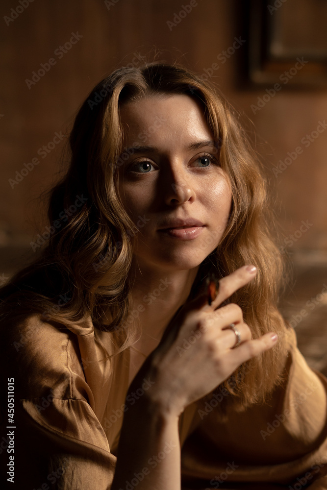 Young attractive female sitting with butterfly on her hand Young attractive female sitting with butterfly on her hand
