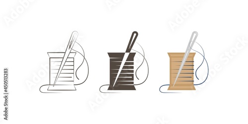 Spool of thread with a needle.