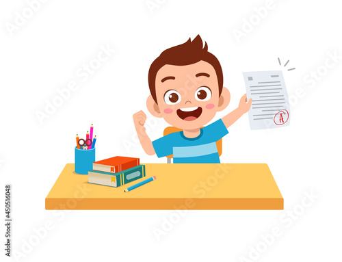 cute little boy feel happy because get good grade from exam