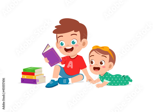cute little boy read book with baby sister sibling together