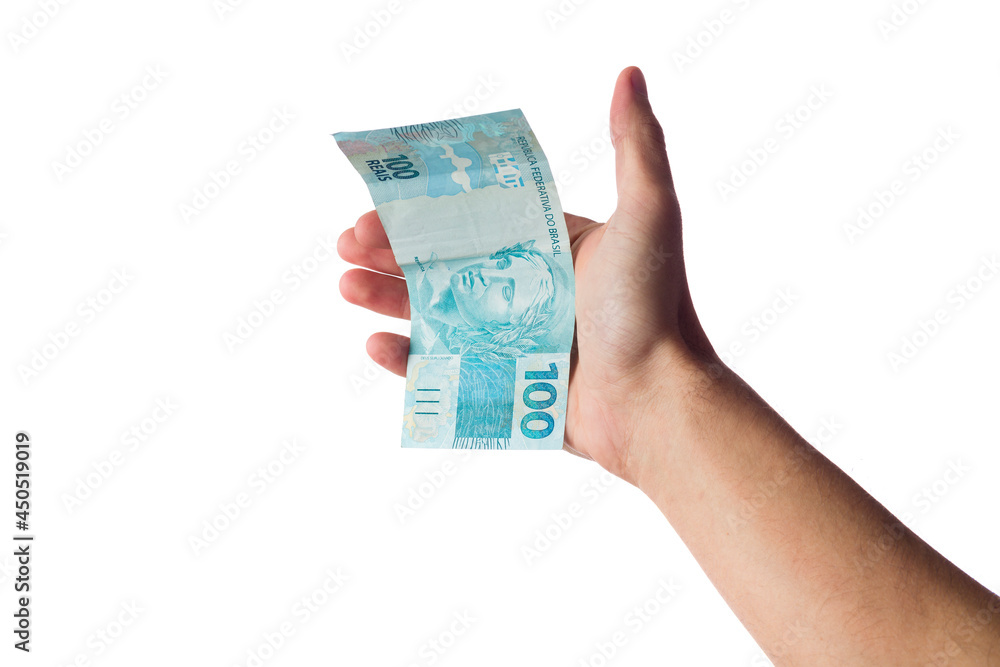 man holding hundred reais bills isolated on white. Brazilian money man holding hundred reais bills isolated on white. Brazilian money