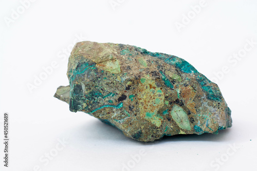 copper ore from a copper mine in Chile, a green stone on a white background. photo