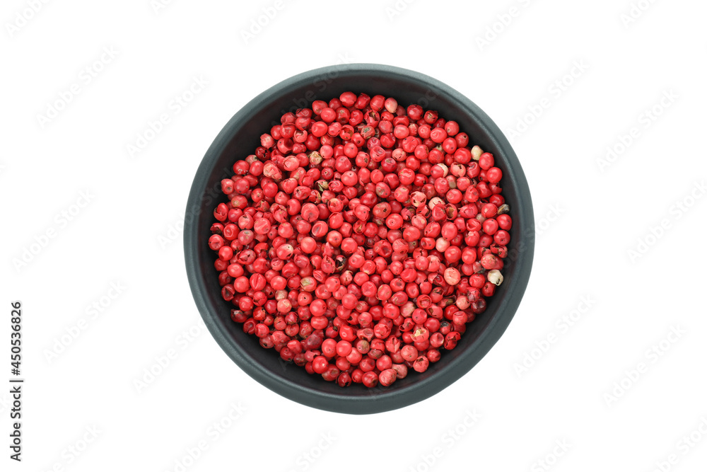 Black bowl of red peppercorns isolated on white background Black bowl of red peppercorns isolated on white background