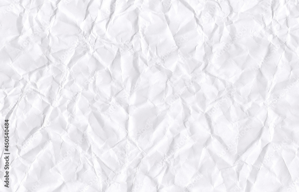 Crumpled paper texture. White crumpled paper surface. Creased white paper with folds background. Crumpled paper texture. White crumpled paper surface. Creased white paper with folds background.