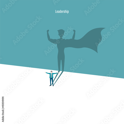 Businessman with superhero shadow