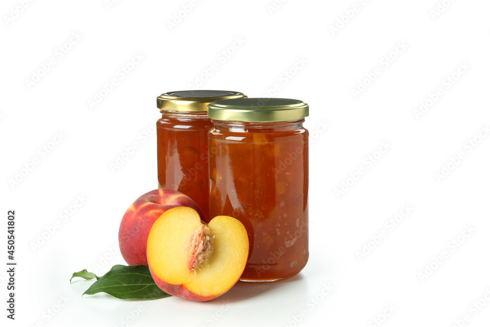 Jars of peach jam and ingredient isolated on white background Jars of peach jam and ingredient isolated on white background