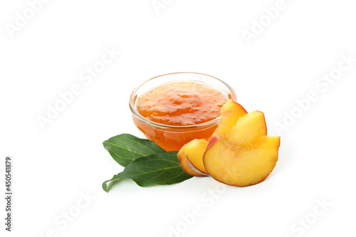 Bowl of peach jam and ingredient isolated on white background