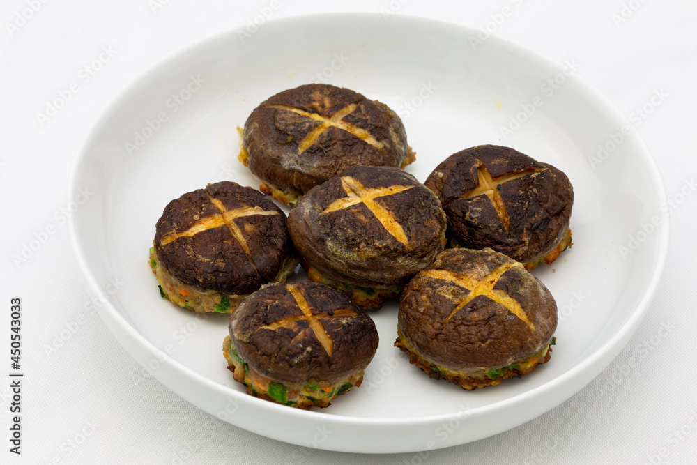 Korean food Pyogobeoseot-Jeon which is fried Shiitake mushroom with meatball Korean food Pyogobeoseot-Jeon which is fried Shiitake mushroom with meatball