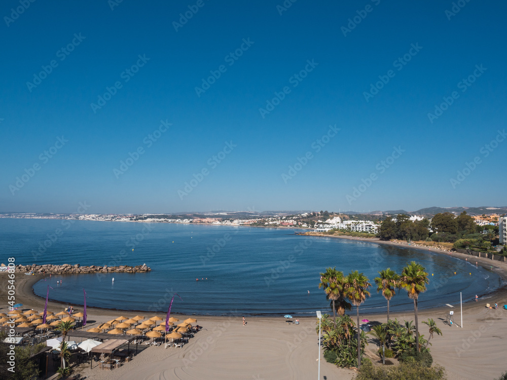 Aerial view of beach of Christ, the best beach in the city . Sun and beach in the Mediterranean Sea on the Costa del Sol
