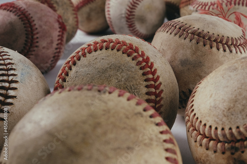 Old vintage texture of used baseballs for sports game equipment background pattern.