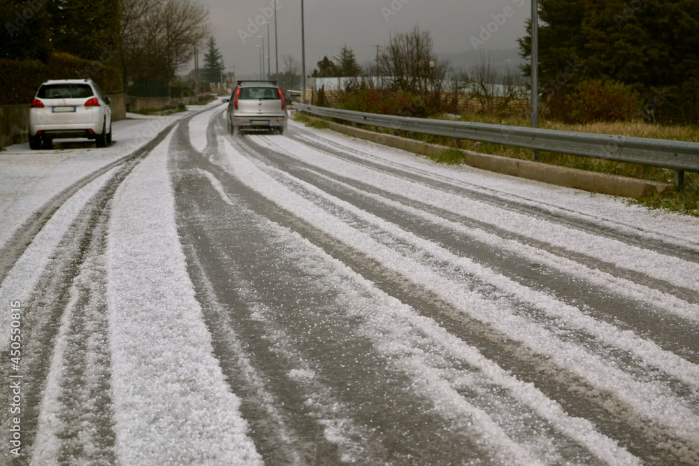 Road with hail that looks like snow. Road with hail that looks like snow.