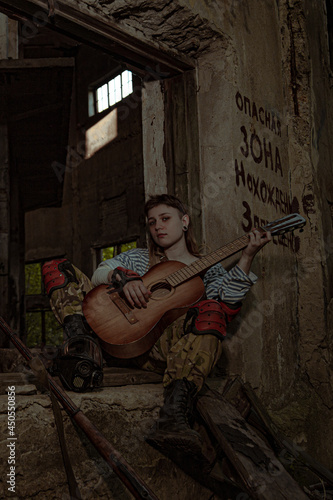 Stalker woman playing a guitar