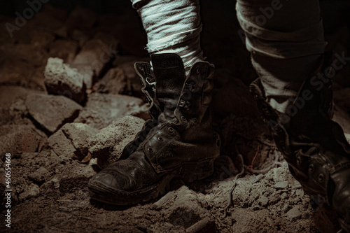 old dusty boots at night