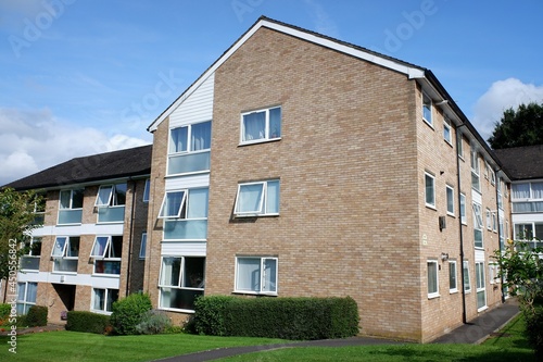 Town centre private apartments built in the 1960s with communal grounds © Peter Fleming