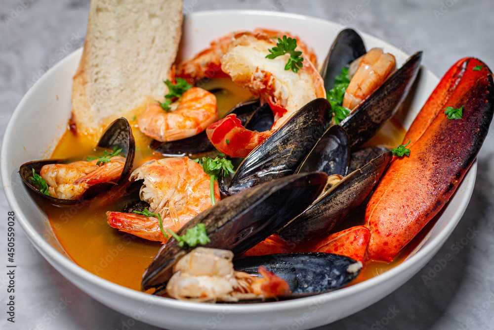 Lobster shrimp mussel soup bisque seafood bowl Lobster shrimp mussel soup bisque seafood bowl