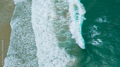 Aerial drone photo waves breaking to rock,no body.Beautiful waves crashing on the rocks Coast islands.