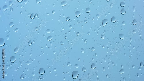 Rain drop on the glass background. Rainy day. View from the window on rainy weather. 25FPS, downscaling. photo