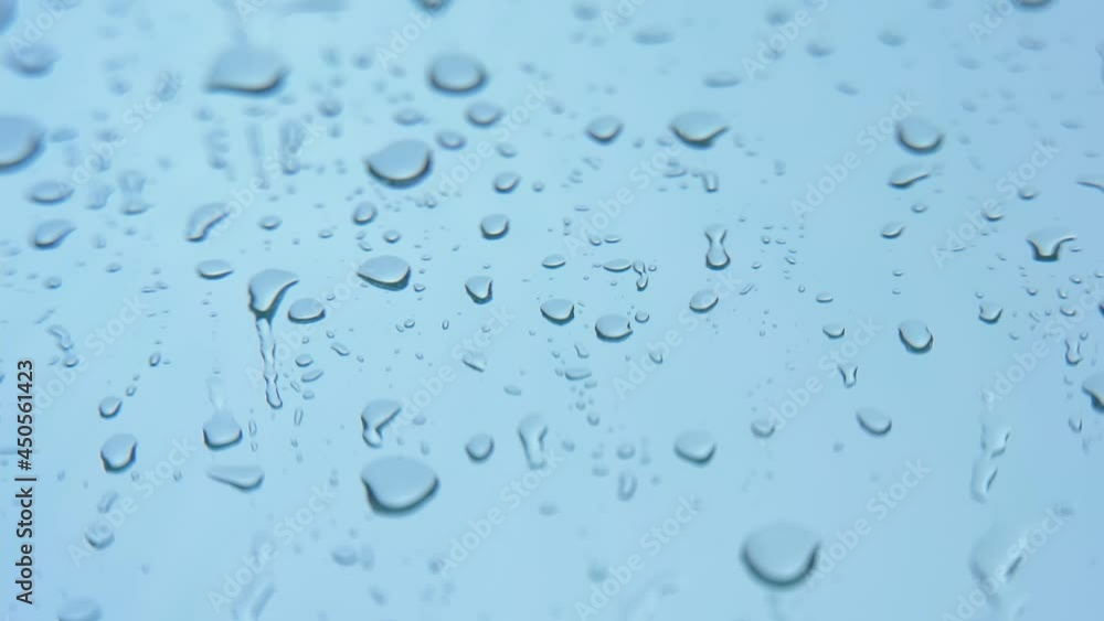 Rain drop on the glass background. Rainy day. View from the window on rainy weather. 25FPS, downscaling. Rain drop on the glass background. Rainy day. View from the window on rainy weather. 25FPS, downscaling.