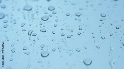 Rain drop on the glass background. Rainy day. View from the window on rainy weather. 25FPS, downscaling. photo