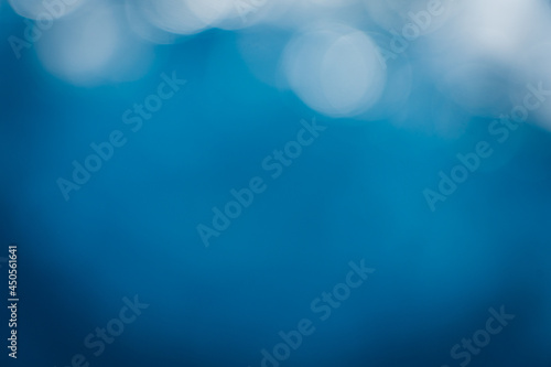 Bokeh sea water splashing waves backgrounds.Blue sea water.Blue pattern backgrounds.wallpaper white circle .