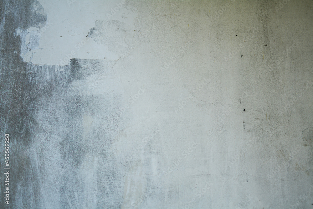 Obraz premium old white wall covered with dirty plaster with a visible structure