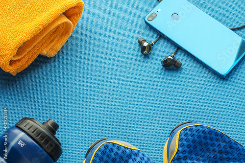 Concept healthy lifestyle, sport and diet. Top view, text space. Athlete's set.  Flat lay composition. Sports unisex, male and female fitness.