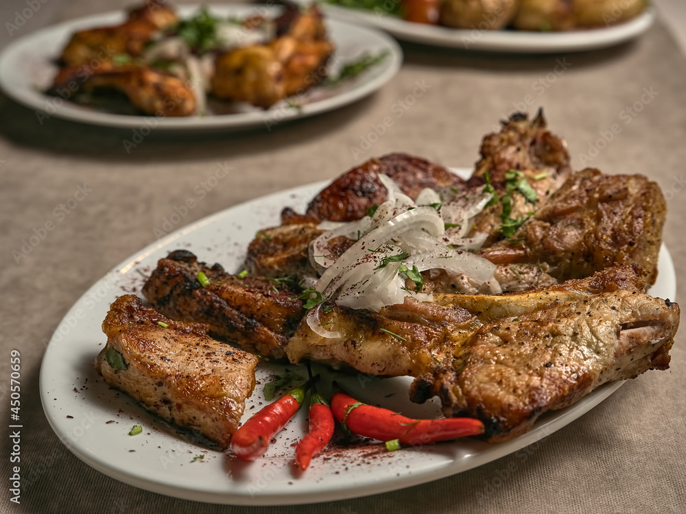 Fried ribs with spices and vegetables