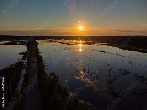 Evening sunset on the lake from a bird s-eye view