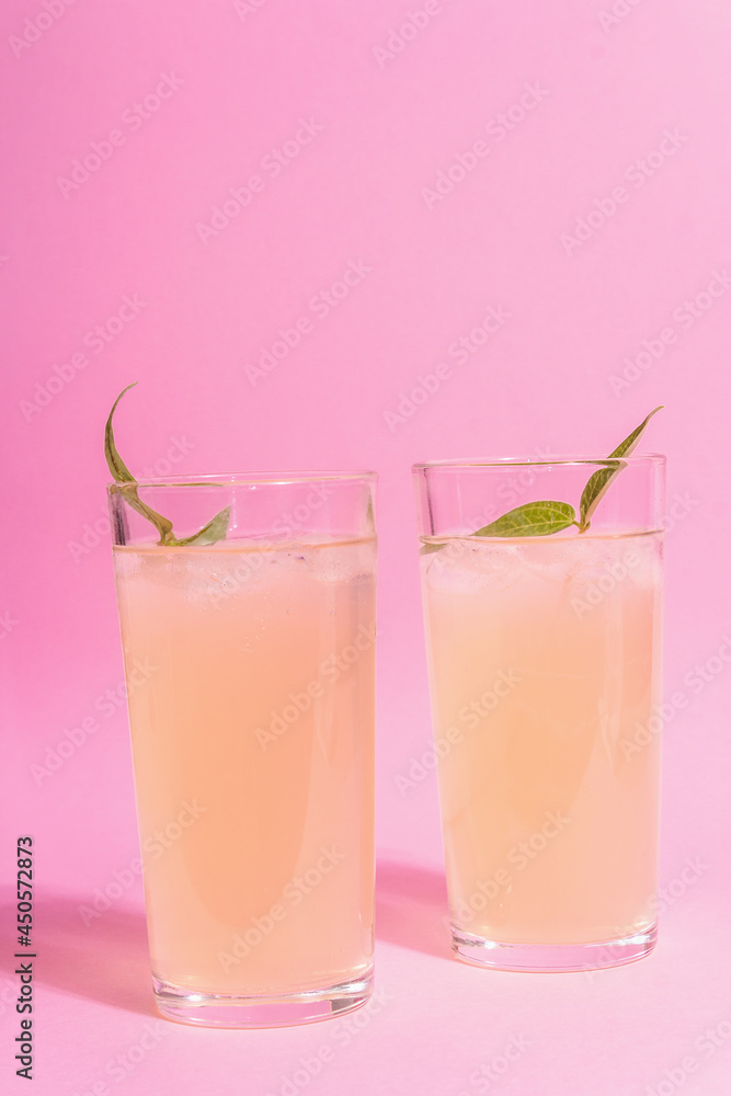 Summer refreshing cocktail. Cold sweet drink, modern hard light, dark shadow Summer refreshing cocktail. Cold sweet drink, modern hard light, dark shadow