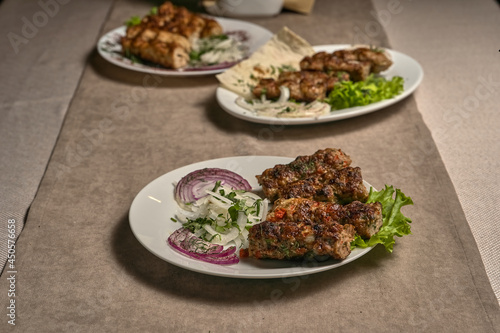 Beef lula kebab with herbs and onions