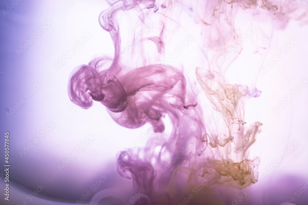 Fototapeta premium drops of ink paint in the water smooth background