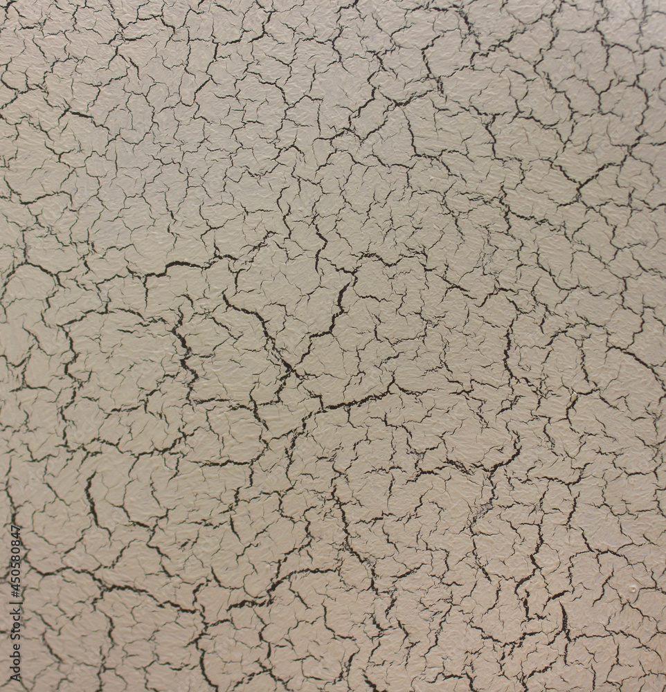 background wall painted in craquelure style with cracks close-up background wall painted in craquelure style with cracks close-up