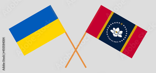Crossed flags of Ukraine and the State of Mississippi. Official colors. Correct proportion
