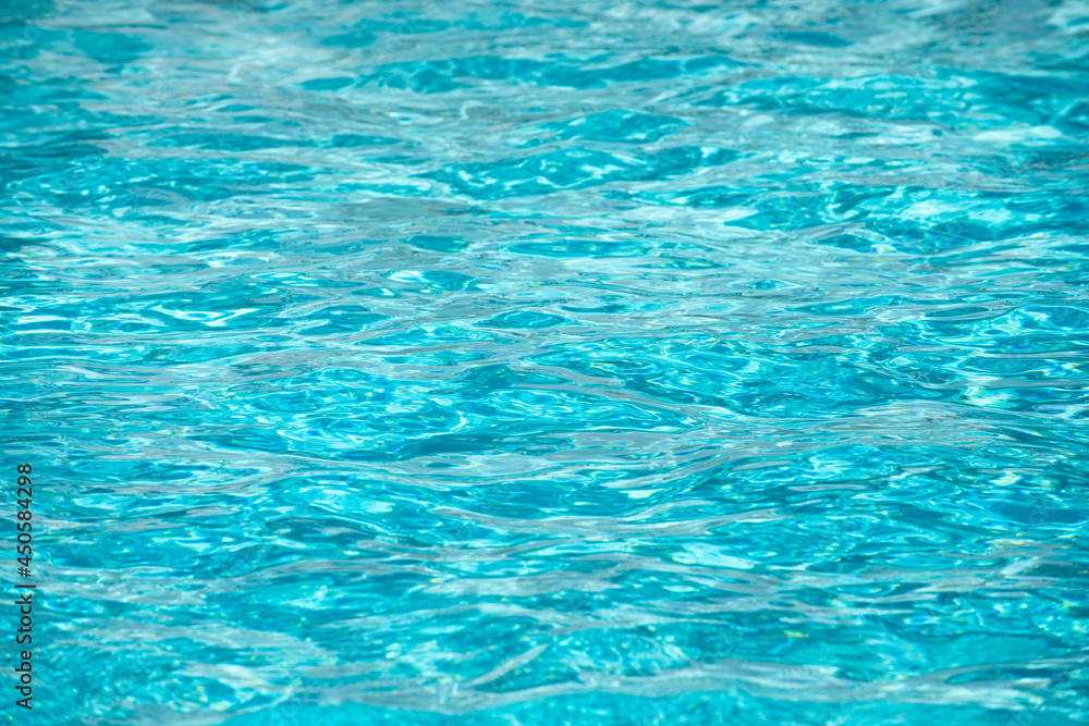 Water in swimming pool, background with high resolution. Wave abstract or rippled water texture.