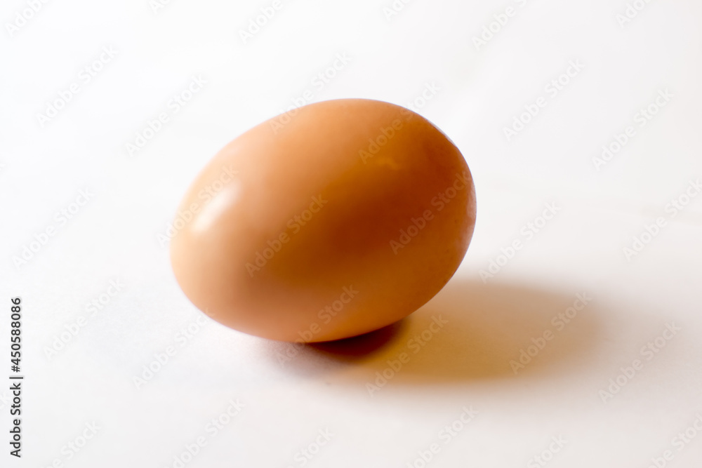 Fresh and beautiful brown egg on white background Fresh and beautiful brown egg on white background