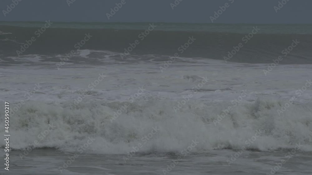 Tidal Wave, Big Giant Waves, Strong Tides on The Beach During Wind Storm Bali Indonesia in Slow Motion Tidal Wave, Big Giant Waves, Strong Tides on The Beach During Wind Storm Bali Indonesia in Slow Motion