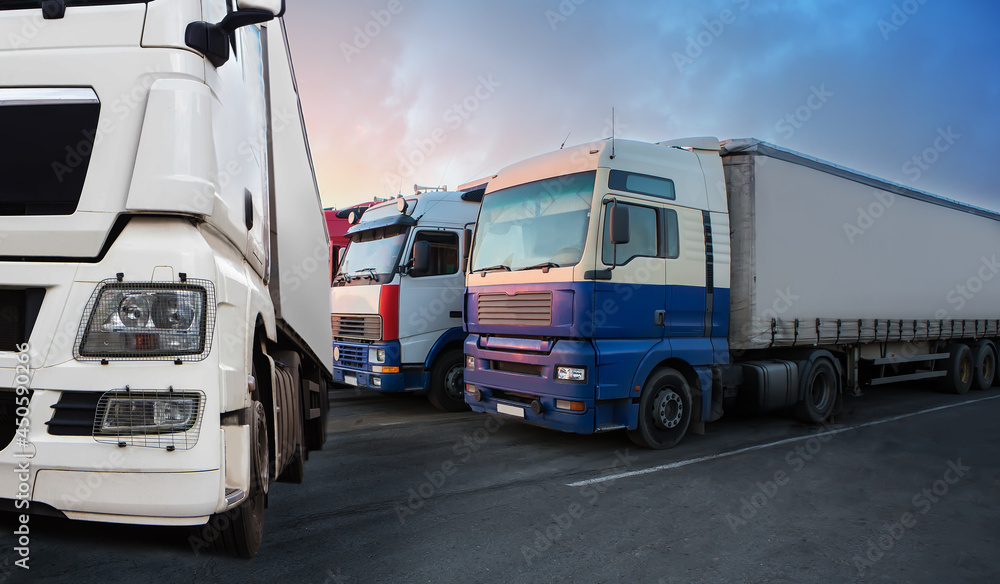 Trucks in a row in the parking lot Trucks in a row in the parking lot
