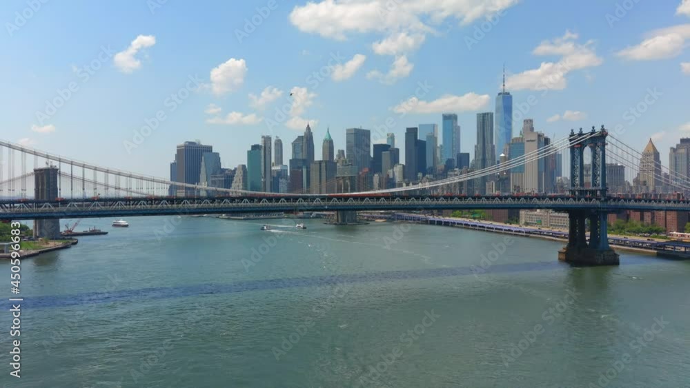 Epic Crane Shot View of the Brooklyn and Manhattan Bridge with New York City in the Background Epic Crane Shot View of the Brooklyn and Manhattan Bridge with New York City in the Background