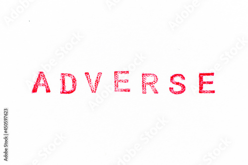 Bilde på lerret Red color rubber stamp in word adverse on white paper background