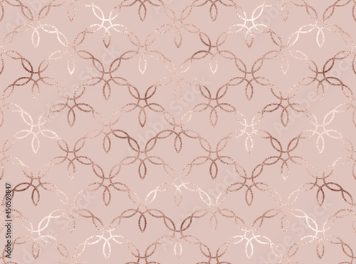 Geometric seamless pattern with rose gold decorative flower tiles.