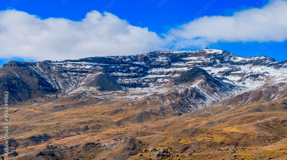 In the early morning rain and hail fell at sunrise I saw this beautiful hill covered with hail, very typical in the sierra of Peru, this place is close to the city of Hauncavelica