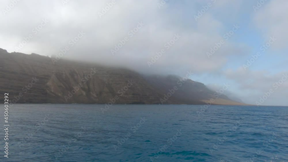 Rocky Cliff At The North Coast Of Lanzarote In Front Of La Graciosa In Canary Islands, Spain. aerial Rocky Cliff At The North Coast Of Lanzarote In Front Of La Graciosa In Canary Islands, Spain. aerial