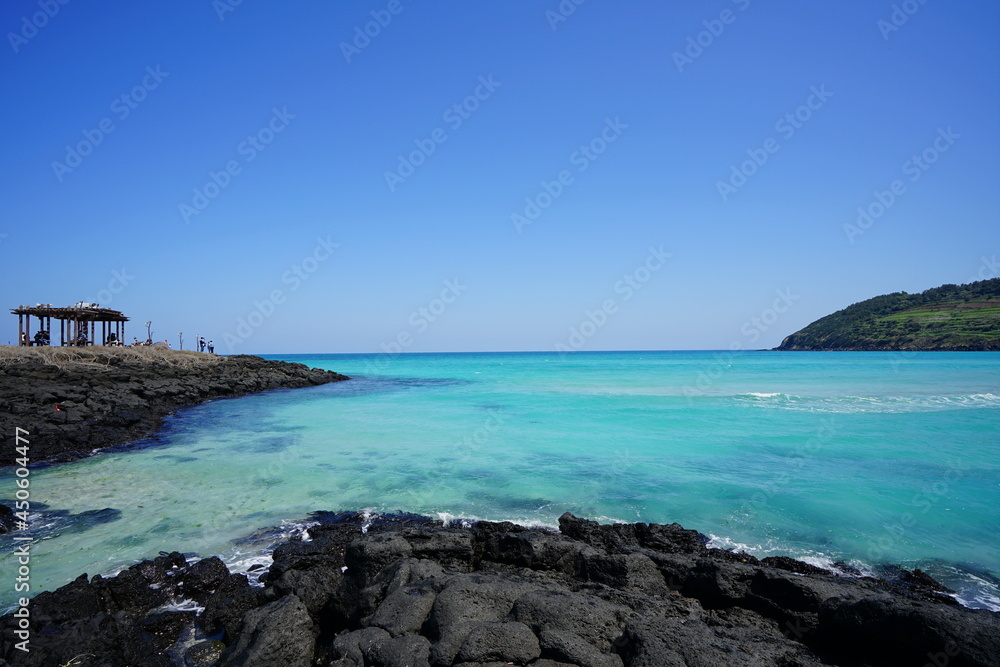 a fascinating seaside landscape with clear bluish water