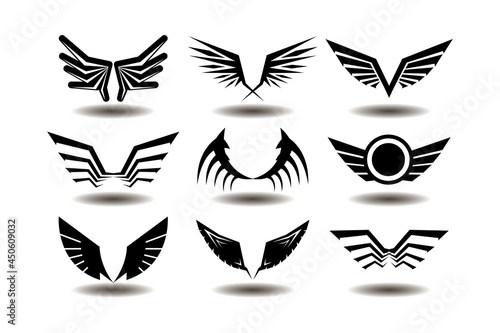 vector illustrations flying symbols  black shapes  wings set collection