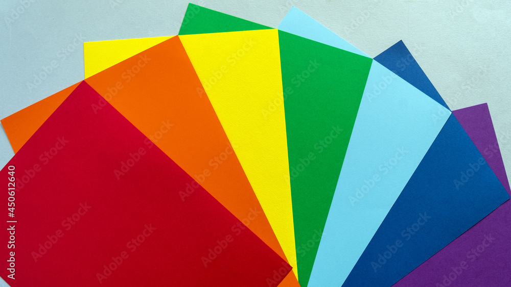 Sheets of multi-colored paper. Colors of rainbow. LGBT community symbol.
