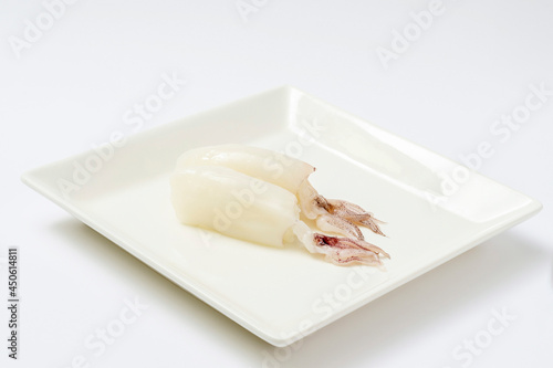 squid sushi on a plate