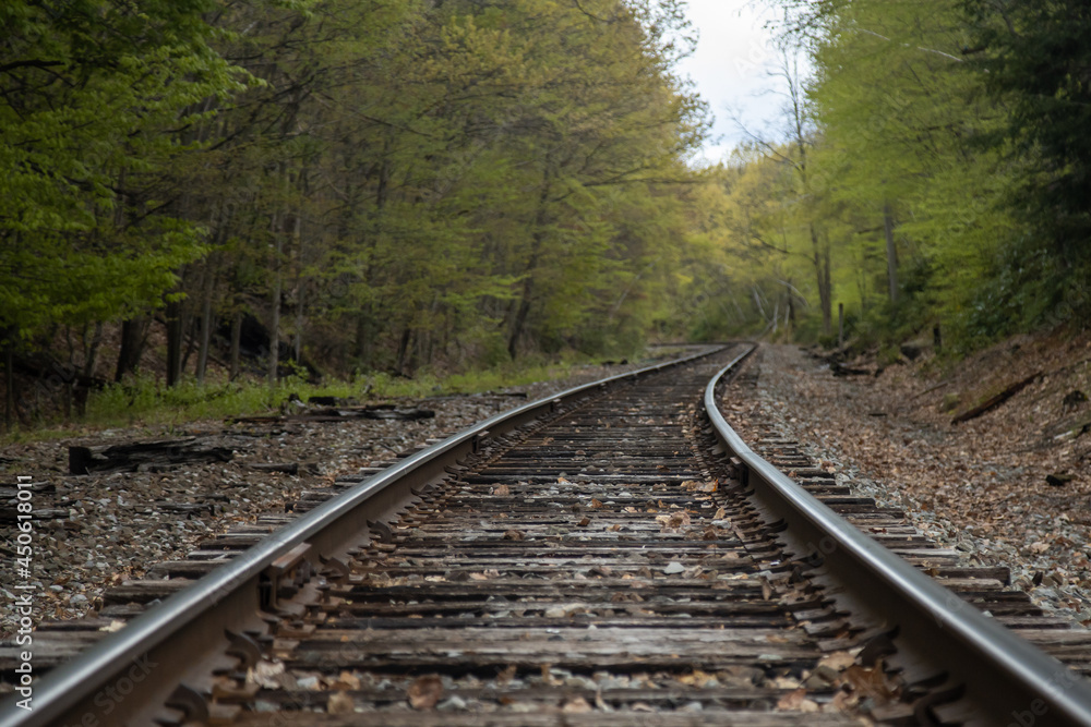 A view into curved and disappearing railroad tracks