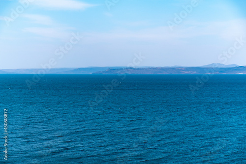 View of the Amur Bay. Sea view from the city of Vladivostok. Mountains on the other side of the sea.