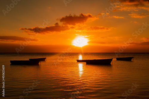 Fishing boat on the beach of Albion at sunset in the west of the republic of Mauritius  East Africa