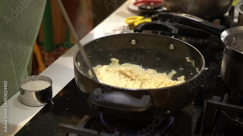 Wallpaper Mural women  cooking shira indian sweet dish in pooja  rituals Suji ka halwa Torontodigital.ca